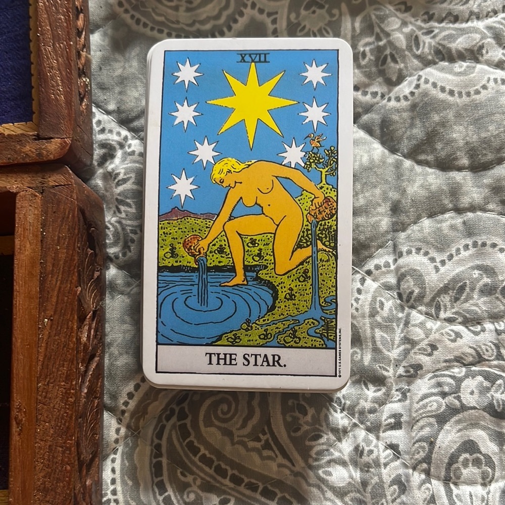 Tarot cards and beautiful wooden box to store.